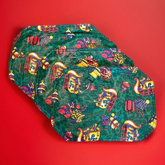 4 Vintage Vinyl Christmas Placemats Colorful Reversible Holiday Sleigh Toys - Picture 1 of 5